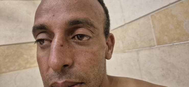 צילום:חסן שעלאן שוטרים תקפו גבר אזוק בג'סר א-זרקא