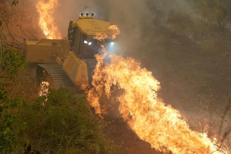 צילום: Cesar MANSO / AFP שריפה באזור סבררוס ליד אבילה בספרד