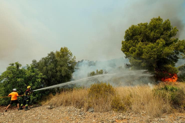צילום: REUTERS/Eva Manez שריפה מערבית ל מדריד ספרד