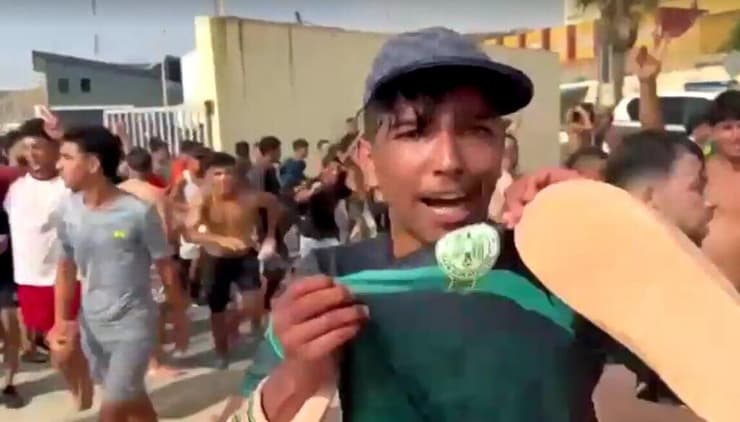 צילום: רויטרס מרוקו ספרד פריצה המונית של מהגרים ל סאוטה דרך הים