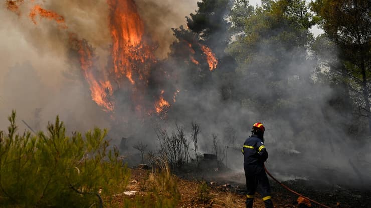 צילום: AP Photo/Michael Varaklas שריפות באזור אתונה, יוון