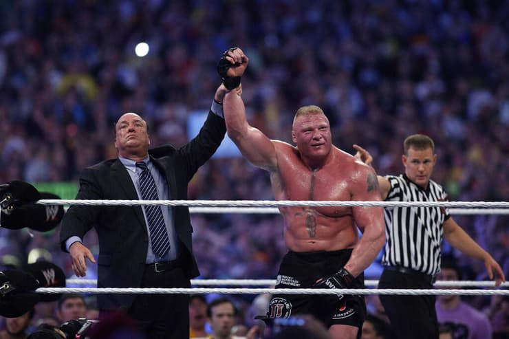 ברוק לסנר ופול היימן. מפלצת גם במונחי WWE (צילום: AP) ברוק לסנר