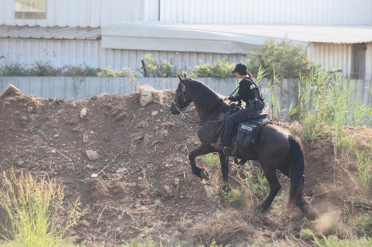 החיפושים אחר אלדר דיין (צילום: יריב כץ) כוחות משטרה בנקודה בה נמצאה גופה