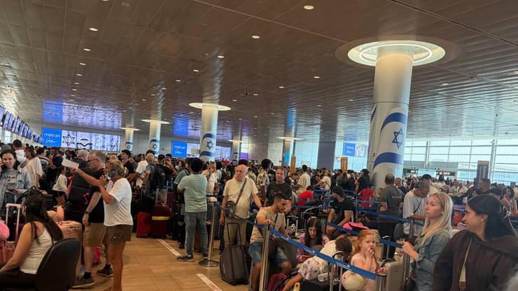 צילום: מאיר תורג'מן נוסעים ממתינים מהבוקר לצ'ק אין בנתב"ג