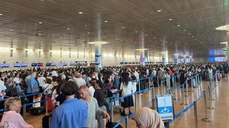 הכאוס בנתב"ג. הכתובת הייתה על הקיר" (צילום: ניר שטיאסני) נתב"ג