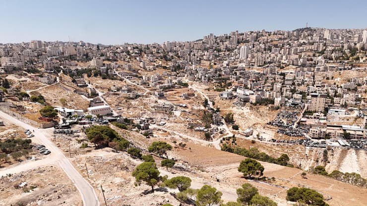 אזור E1 . "נתניהו הצהיר בעבר שישראל תבנה שם אבל נסוג אחרי טלפון מוושינגטון או מגרמניה. עכשיו הוא איבד כל רסן" (צילום: שאול גולן) אזור E1