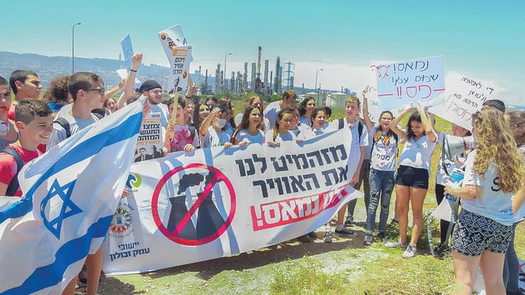 "להאמין שהפעילות תשנה". מחאה של פעילי סביבה (צילום: מגמה ירוקה) "להאמין שהפעילות תשנה". מחאה של פעילי סביבה | צילום: מגמה ירוקה
