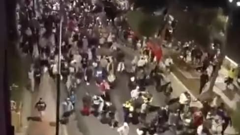 הריצה ההמונית בסאוטה המוני מהגרים רצים ברחובות סאוטה