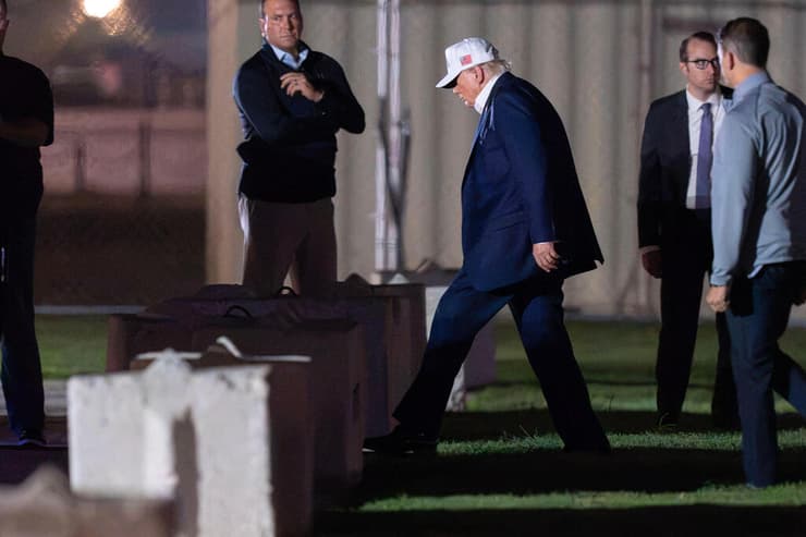 צילום: AP Photo/Jose Luis Magana טראמפ חוזר לבית הלבן