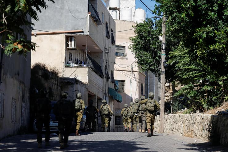 כוחות צה"ל בבידו (צילום: REUTERS/Mohammed Torokman) כוחות צה"ל בבידו