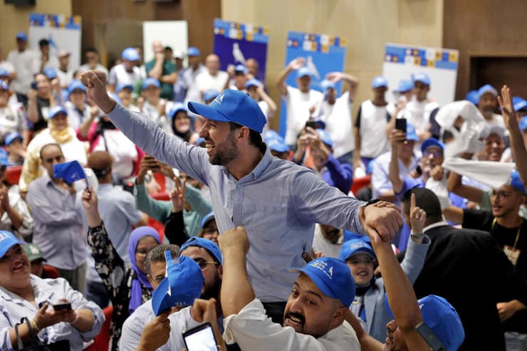 צילום: Abdel Majid BZIOUAT / AFP תומכי מפלגת השלטון ב מרוקו RNI בעצרת בחירות בעיר סלא 17 בספטמבר
