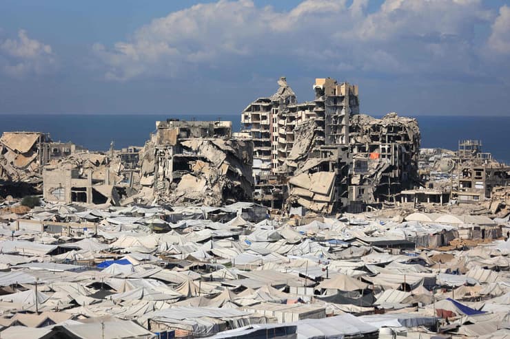 רצועת עזה, הבוקר (צילום: Omar AL-QATTAA / AFP) עזה, שלוש שנים בדיוק לאחר הטבח