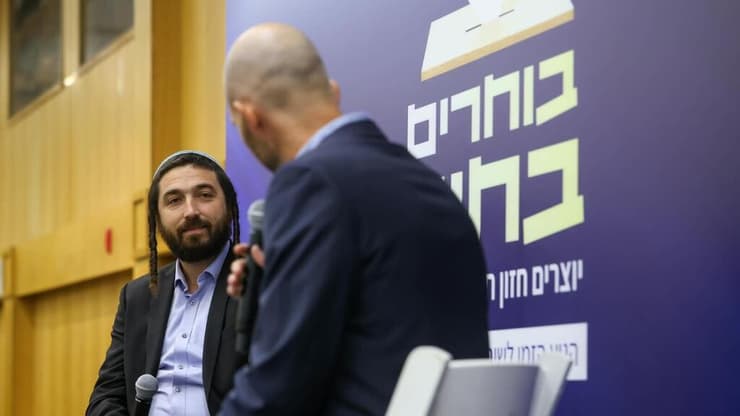 ח"כ צבי סוכות בכנס (צילום: נעם פיינר) ח"כ צבי סוכות בכנס