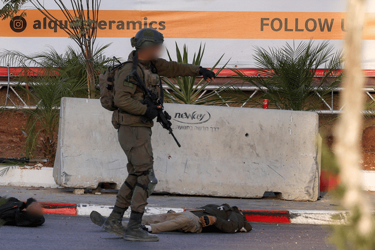 זירת הפיגוע (צילום: HAZEM BADER / AFP) זירת הפיגוע
