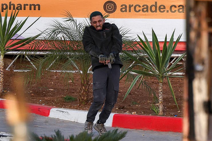 ב-AFP מכחישים שלצלם היה מידע מקדים על הפיגוע (צילום: HAZEM BADER / AFP) זירת הפיגוע