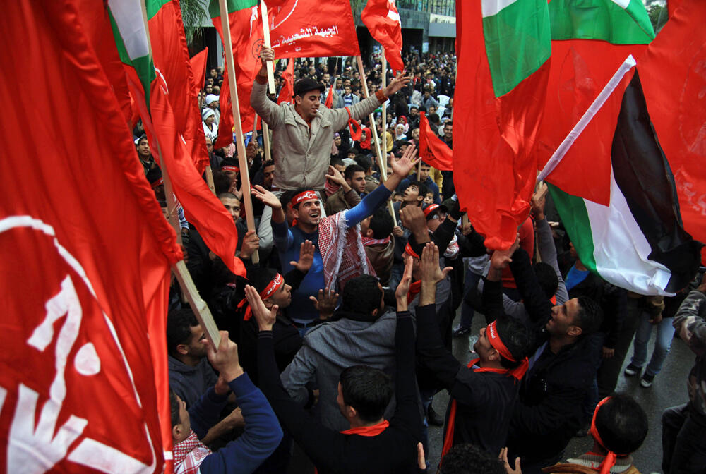 Members of the Popular Front for the Liberation of Palestine march in Ramallah in 2012 