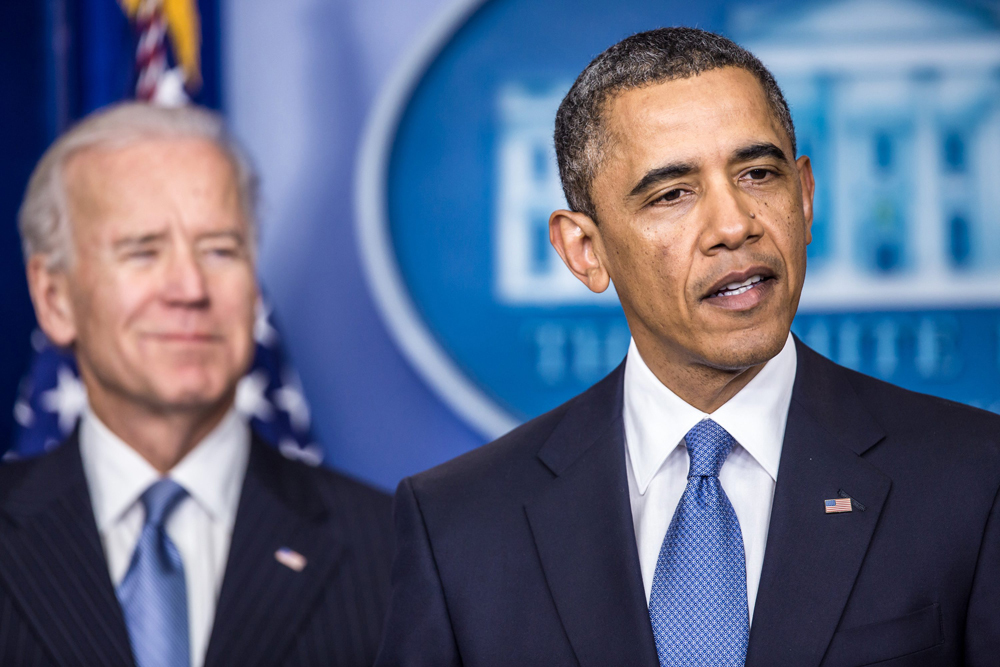 Then-Vice President Joe Biden standing behind then-U.S. President Barack Obama, 2013 