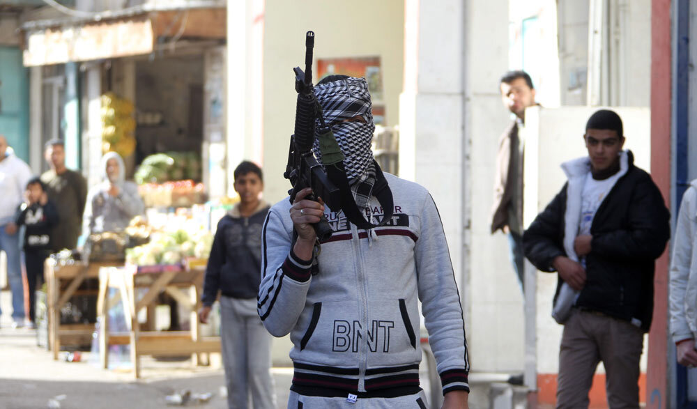 Armed Fatah militiamen in the Balata refugee camp in the West Bank 