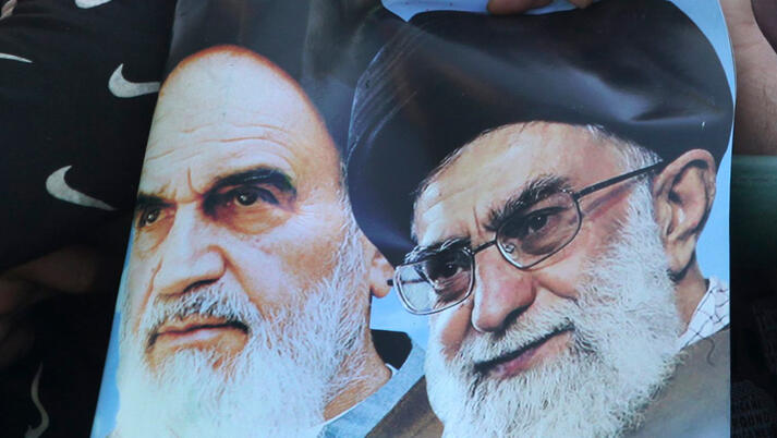 Pictures of Ayatollah Khomeini and Iran's Supreme Leader Ali Khamenei  