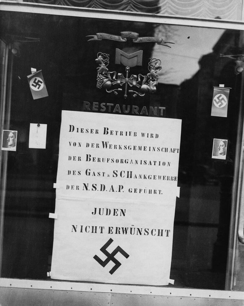 A sign saying 'Jews aren't welcome' in Vienna, Austria, after the Anschluss 