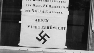 A sign saying 'Jews aren't welcome' in Vienna, Austria, after the Anschluss 