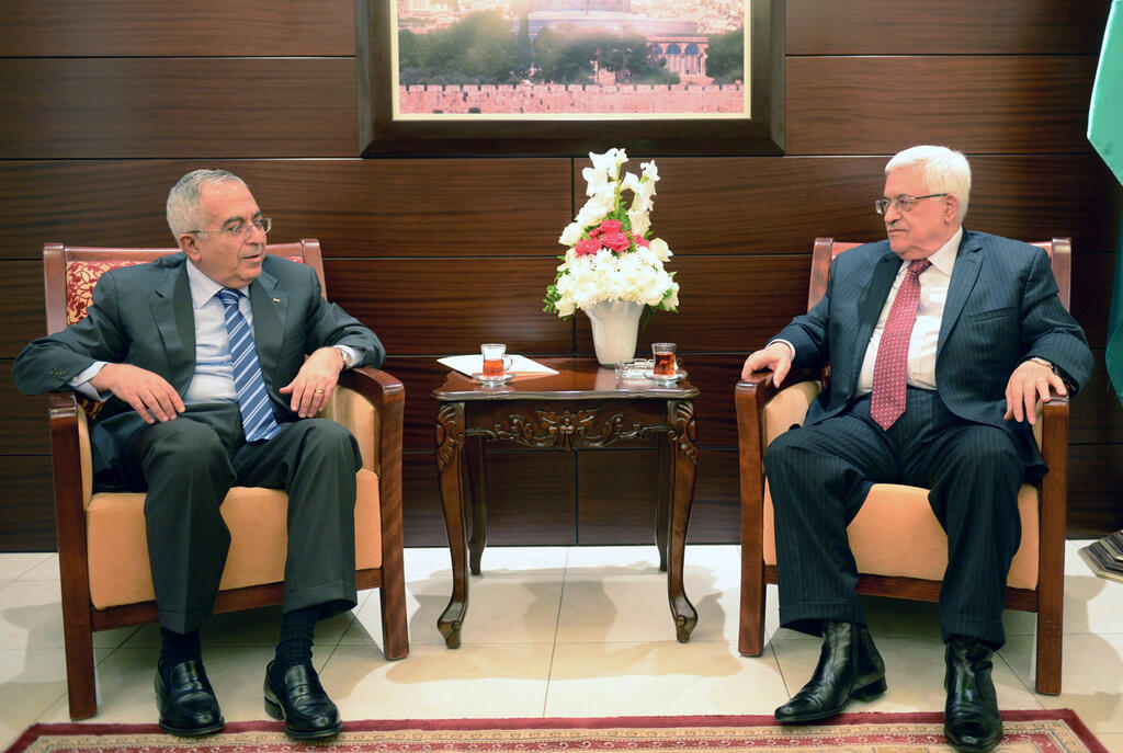 Salam Fayyd and Palestinian President Mahmoud Abbas in 2013 