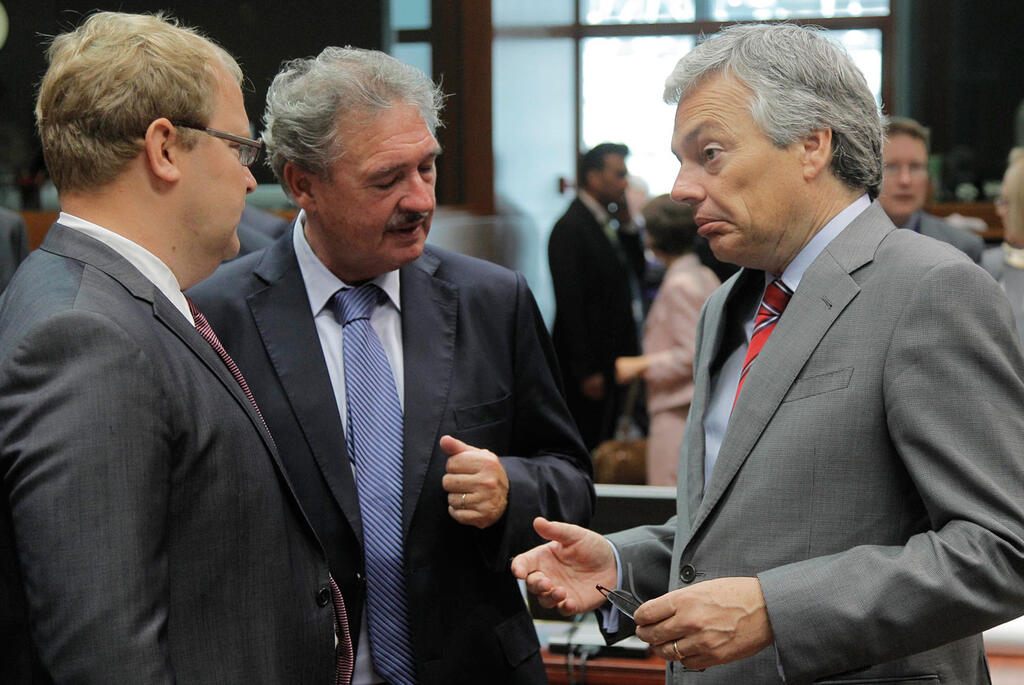 Asselborn with former Belgian Foreign Minister Didier Reynders and Estonian counterpart Urmas Paet
