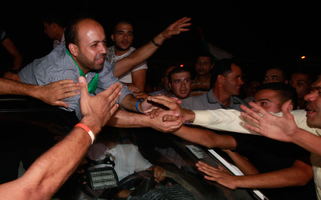 Gazan's greet prisoners released by Israel in deal to free abducted soldier Gilad Shalit in 2013