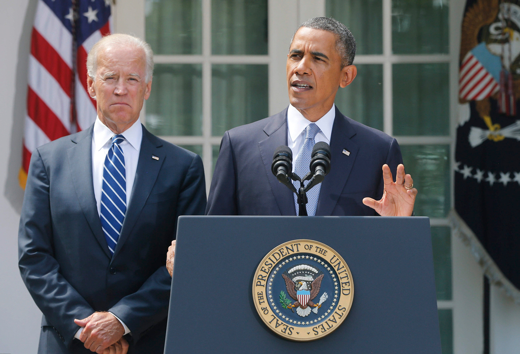 U.S. Vice President Joe Biden and President Barack Obama at the White House in 2013 