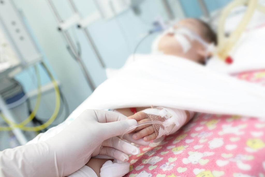 A child in hospital on life support 
