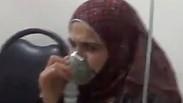 אישה בסוריה לאחר שעברה תקיפה כימית