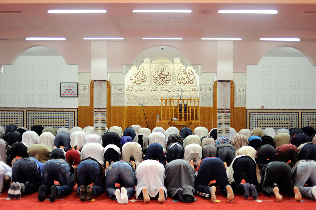 Muslims praying at a mosque in the western French city of Nantes 
