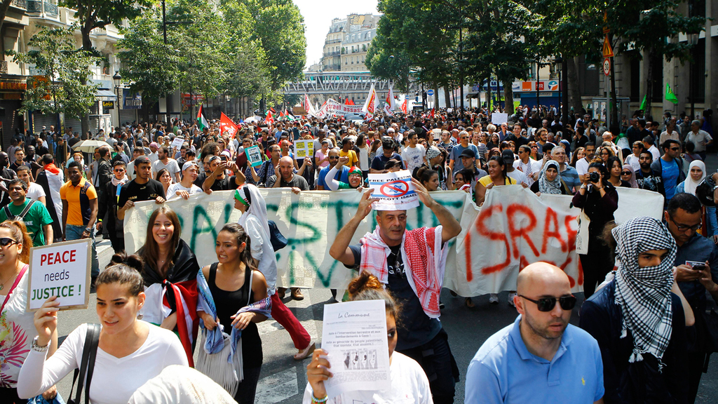 Pro-Palestinian protesters marching Paris during the latest round of fighting between Israel and Gaza's terrorist factions  