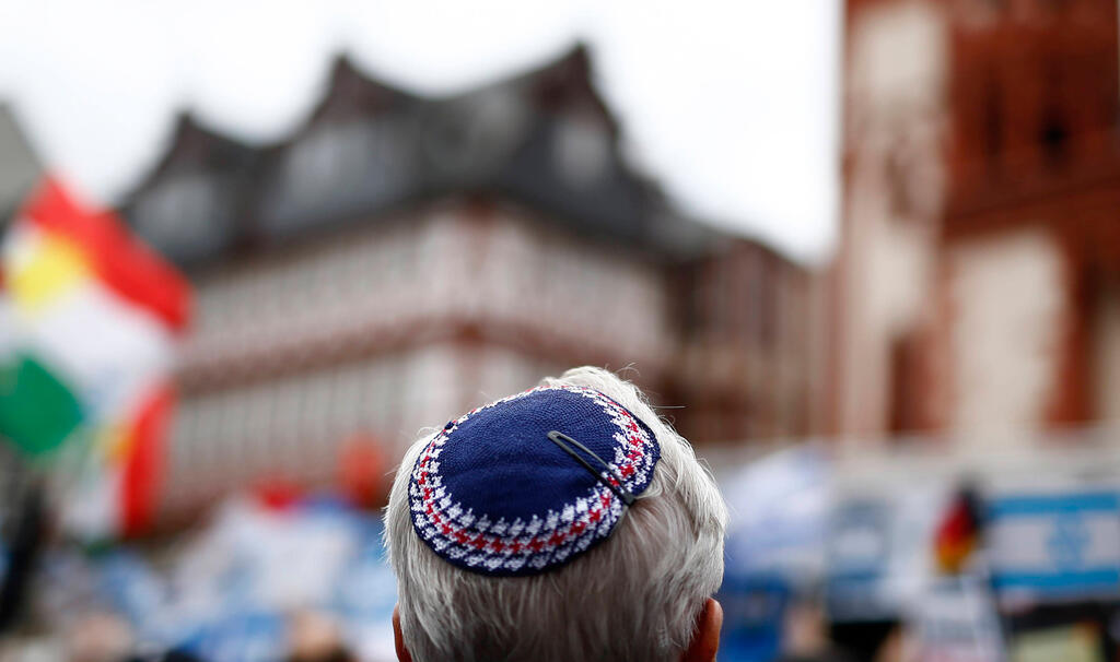 A Jewish man wearing a skullcap during a protest against antisemitism in Frankfurt am Mein, Germany, August 31, 2014 