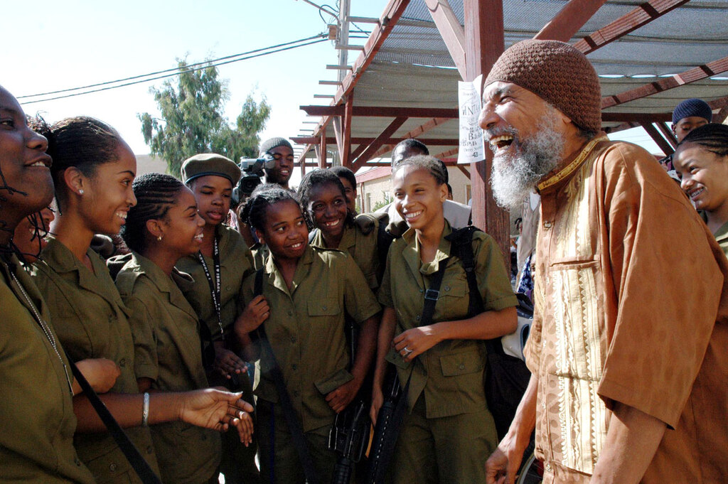 African Hebrew Israelites leader Ben Ammi Ben Israel (Ben Carter) greets girls of the community serving in the IDF, 2005 