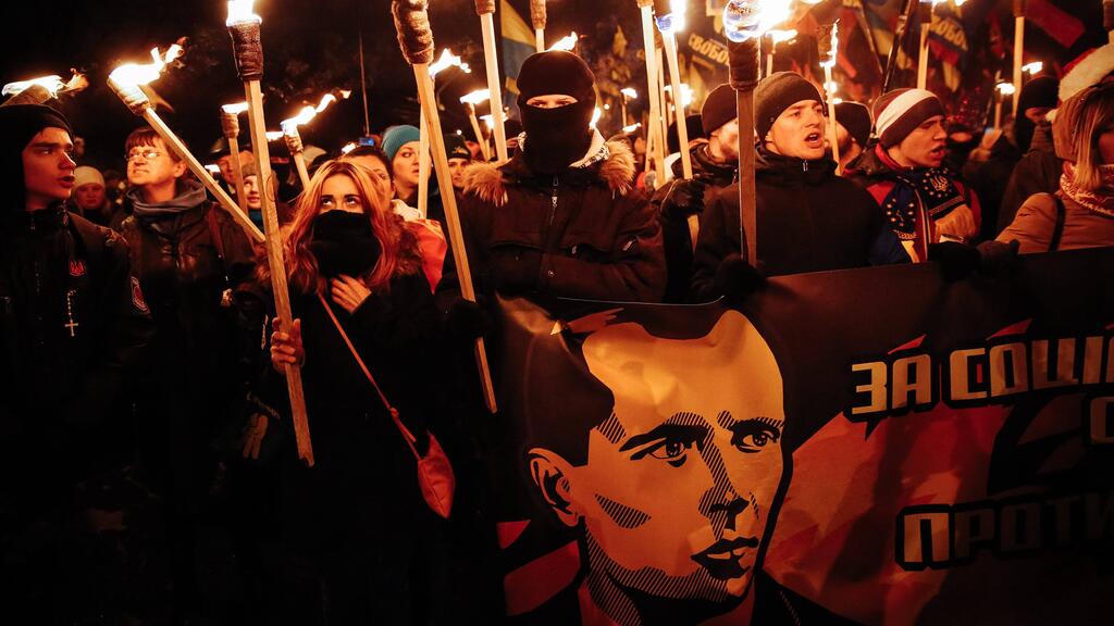 Ukrainian protestors holding Stepan Bandera banners back in 2015 