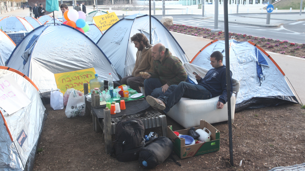 People living in tents in protests of the housing crisis, Tel Aviv, 2015 (Photo: Moti Kimchi) People living in tents in protests of the housing crisis, Tel Aviv, 2015
