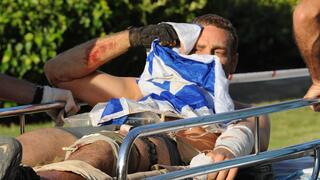 מיכאלי מפונה עטוף בדגל ישראל בקיץ 2014, במהלך מבצע צוק איתן. על התמונה אמר אז: "מקווה שזה יחזק את העורף"