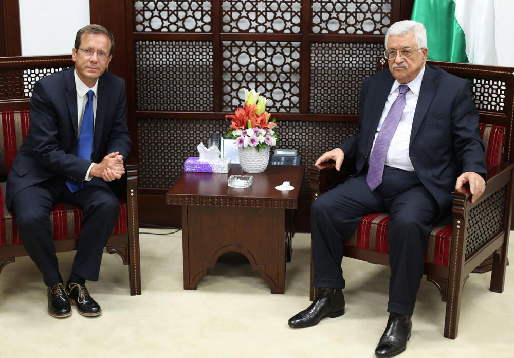 Then-opposition leader Isaac Herzog and Palestinian Authority Chairman Mahmoud Abbas  meeting in Ramallah, August 18, 2018 