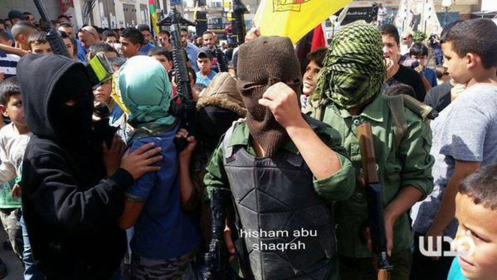 Children dressed up as combatants in Ramallah