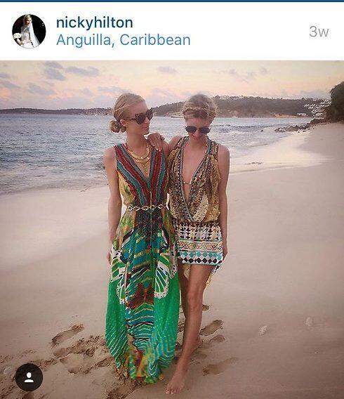 האחיות ניקי ופריס הילטון בחופשה בקריביים. לא רואים בטן