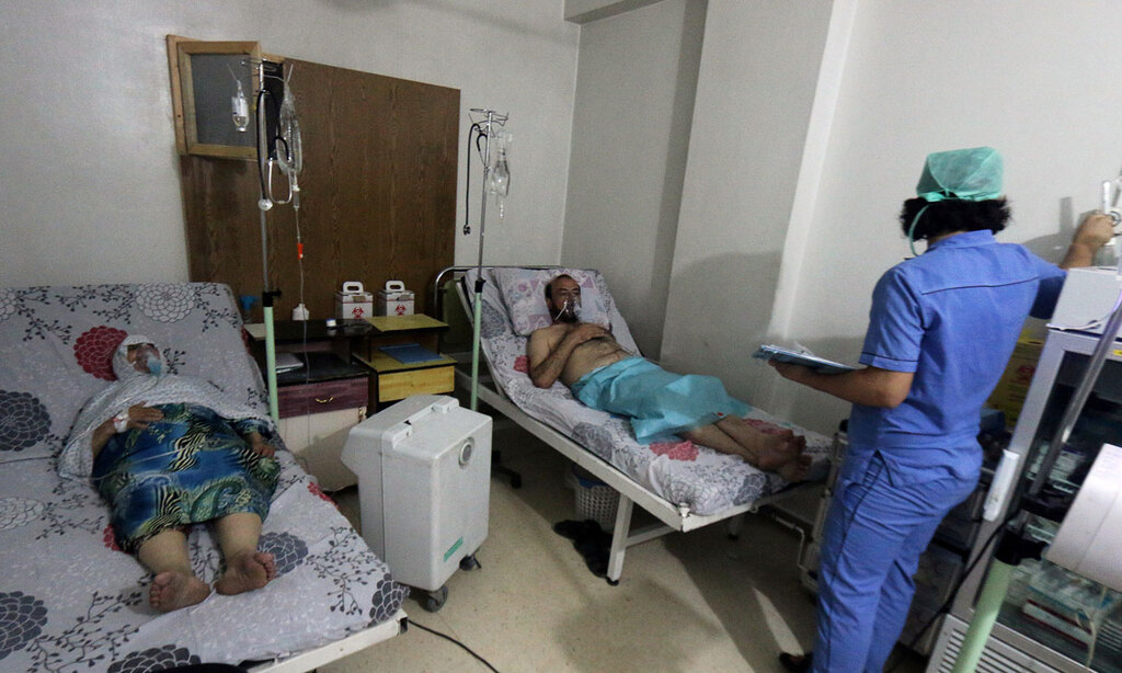 Victims of a gas attack in Aleppo being treated at a local hospital 