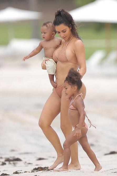 Kim Kardashian walking with daughter North 