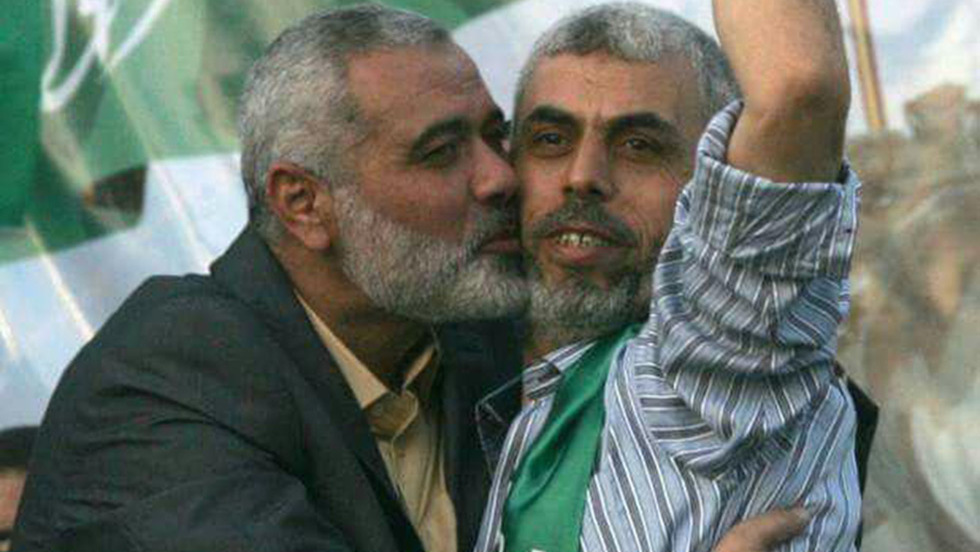 Hamas leader Ismail Haniyeh kisses Yahya Sinwar after his release from Israeli prison in Shalit deal 