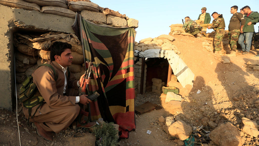 Kurdish fighters in Iraq during battles with Islamic State 