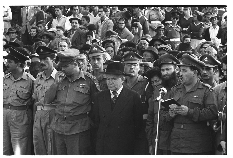 Prime Minister David Ben-Gurion attends a memorial service for soldiers who fell in the Suez Crisis of 1956 