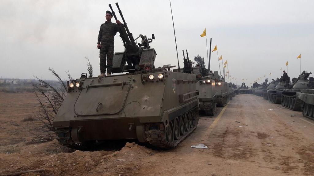 Hezbollah militants using American-made armored vehicles in Syria 