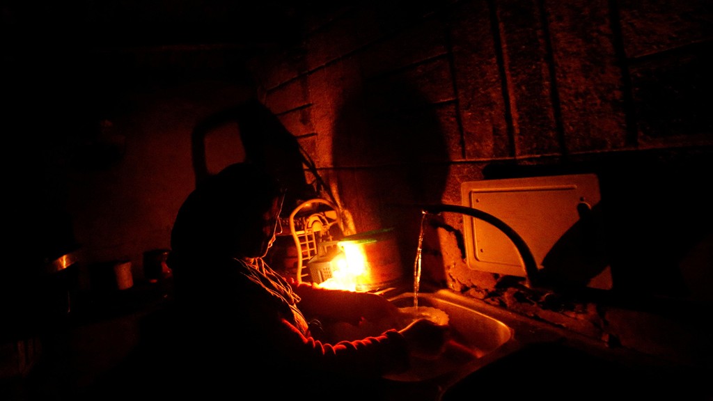 A Gaza resident during power cuts 