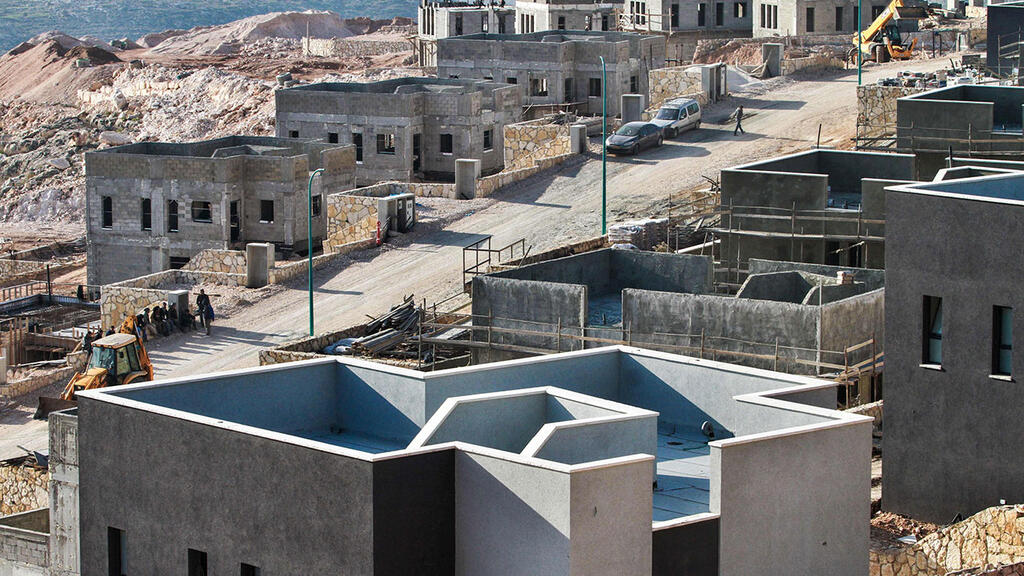 Construction of new housing in a West Bank settlement 