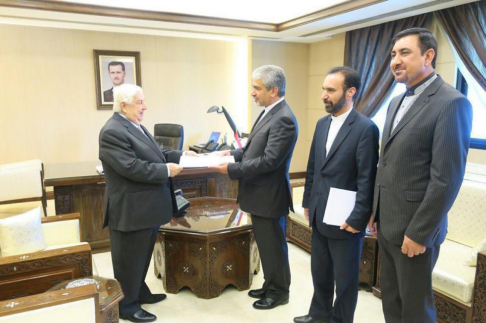 Moallem meeting with Iranian officials in Damascus in 2017 